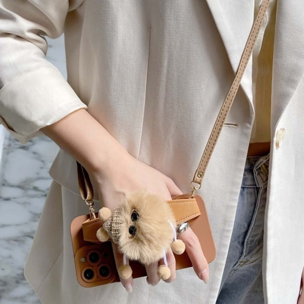 a woman holding a small purse with a stuffed animal in it