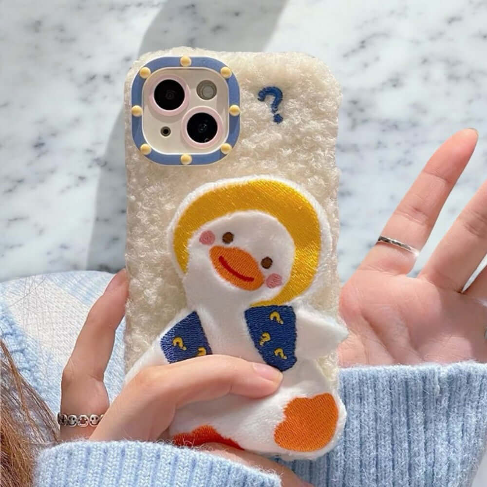 a person holding a phone case with a snowman on it